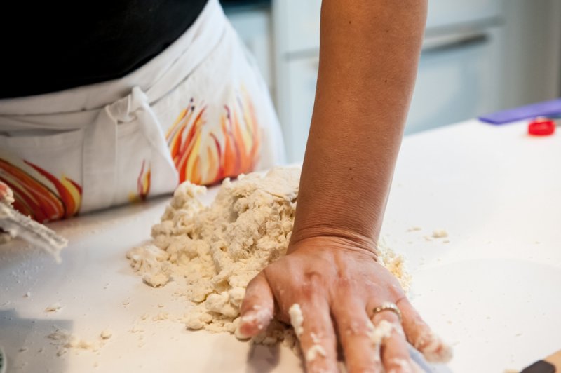 Beginning to knead the dough.