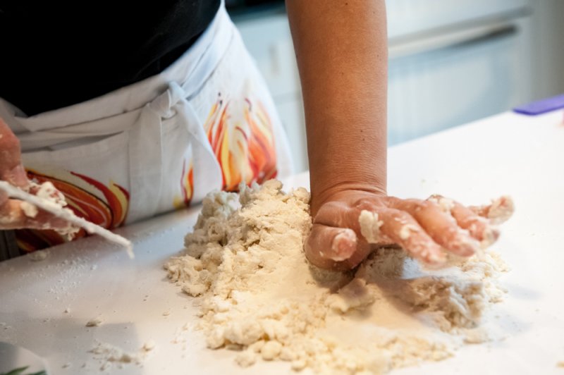 Kneading the pastry together.