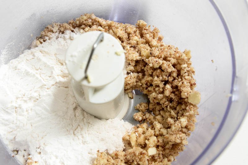 Add the flour and salt to the butter, nut mixture.