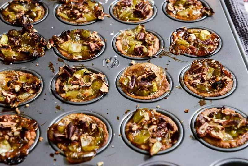 Bake tomatillo tarts until filling has set.