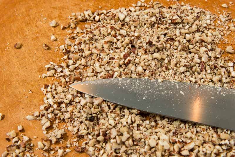 Finely chop the pecans.