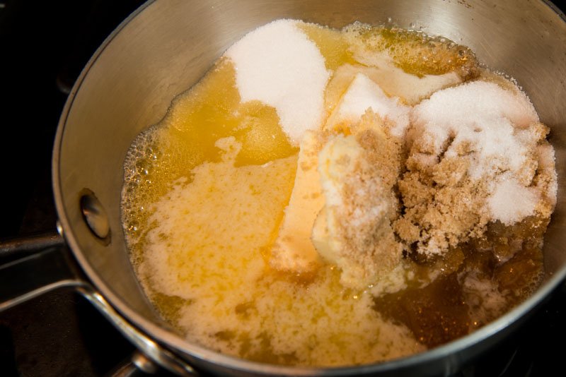 Melt the butter with the two sugars.