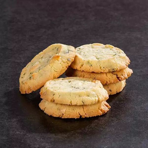 Lemon Cookies with White Chocolate and Mint stacked on a table