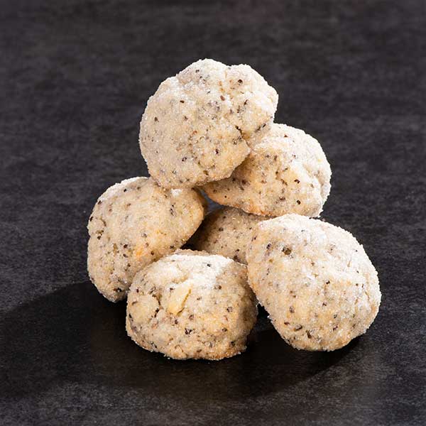 Orange Chia Seed Cookies stacked on a table