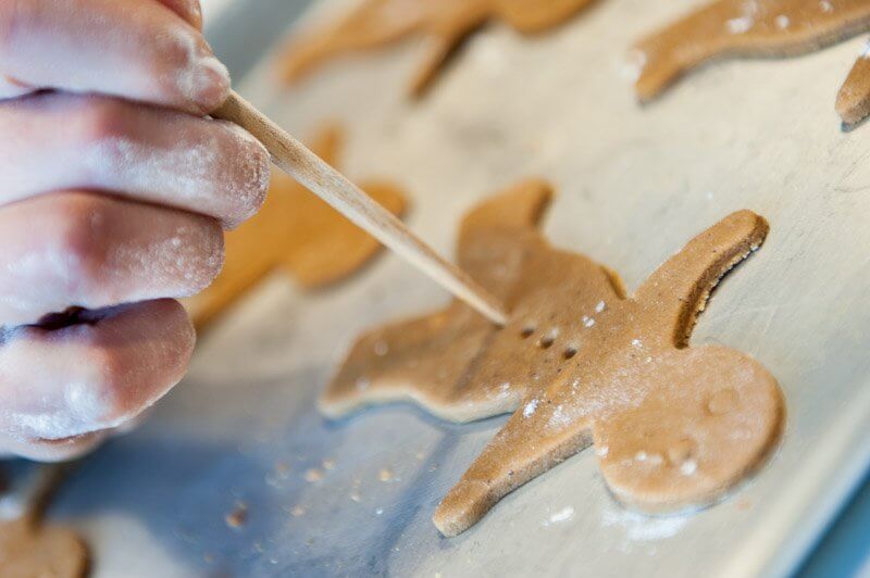 Making the buttons on the Gingerbread men.