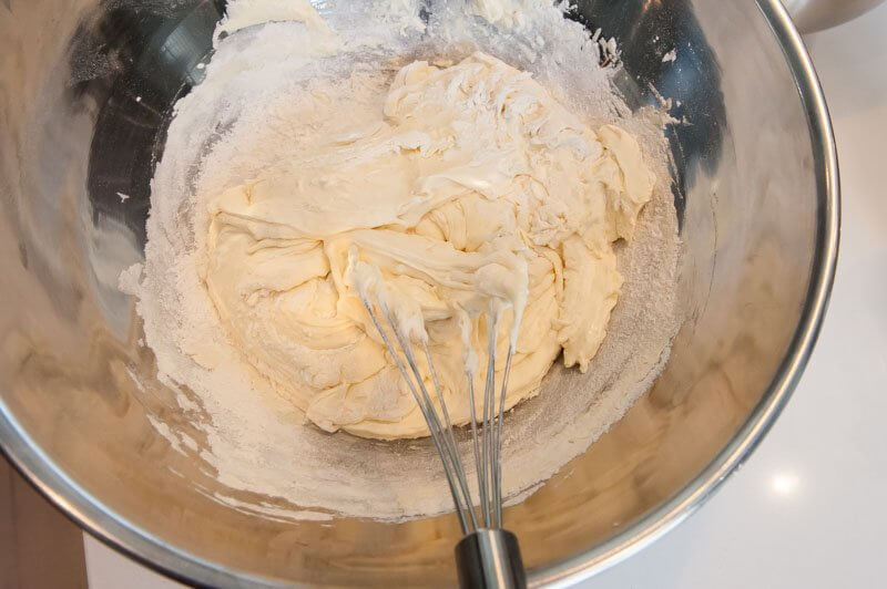 Flour folded into the beaten whole eggs.