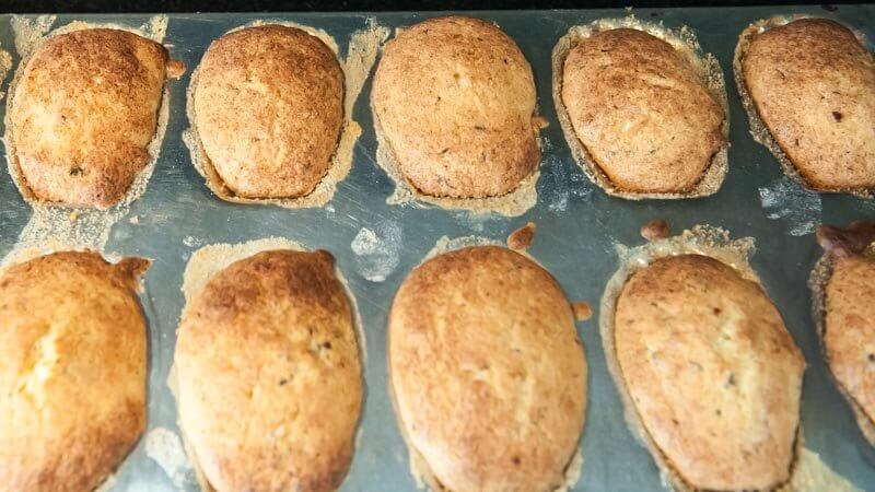 When you over fill the molds, the madeleines grown beyond the cup.