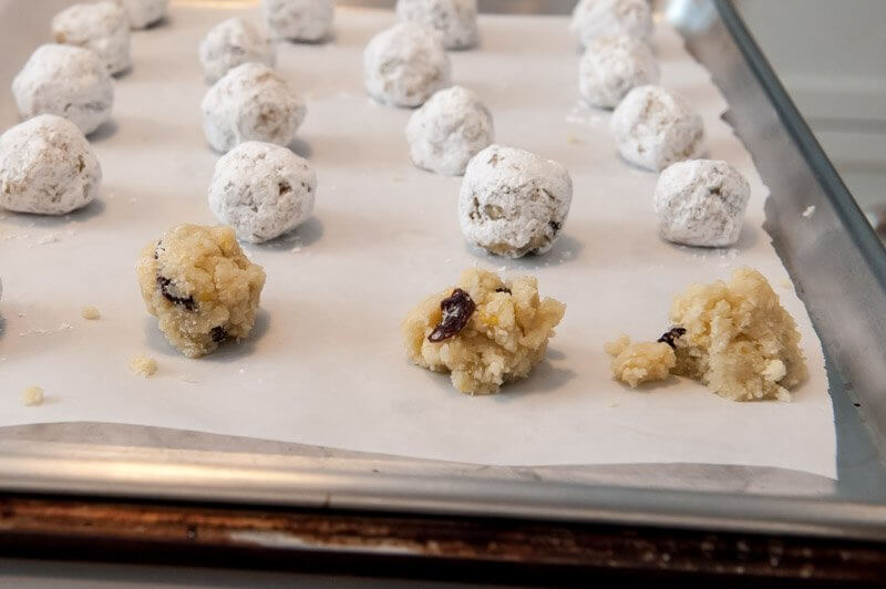 The tray of rolled and unrolled sour cherry amaretti before the oven.