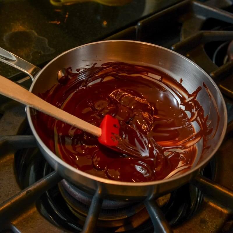 Melting chocolate for the drizzle.