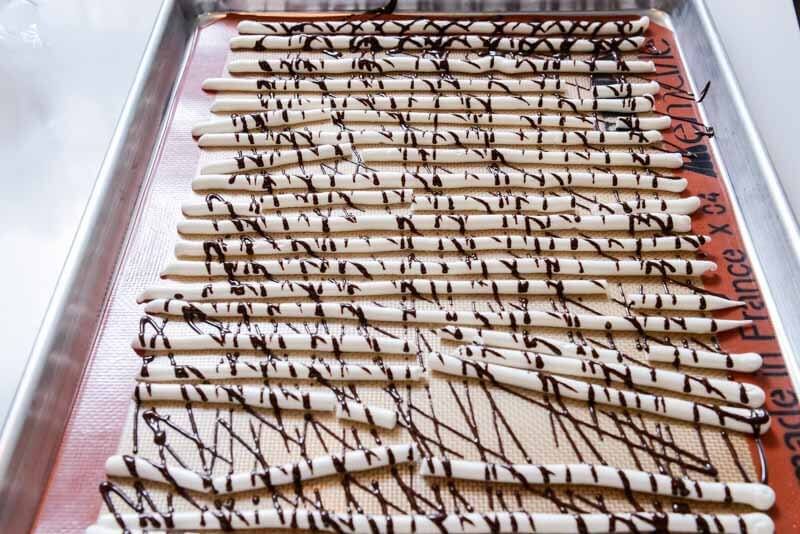 Drizzled chocolate over the Meringue Birch Twigs