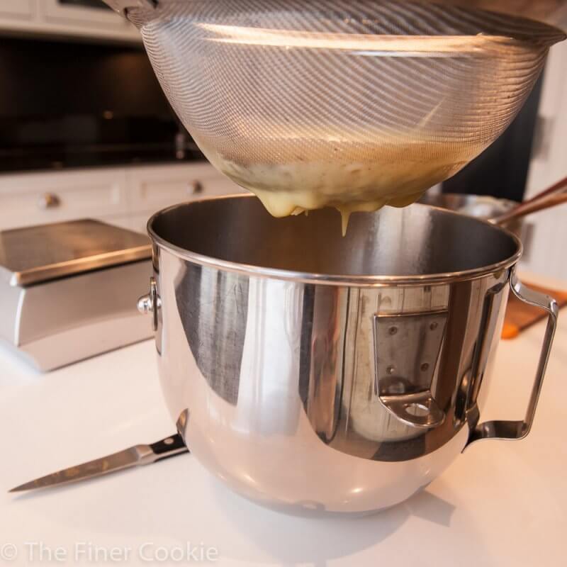 Straining the cooked pastry cream