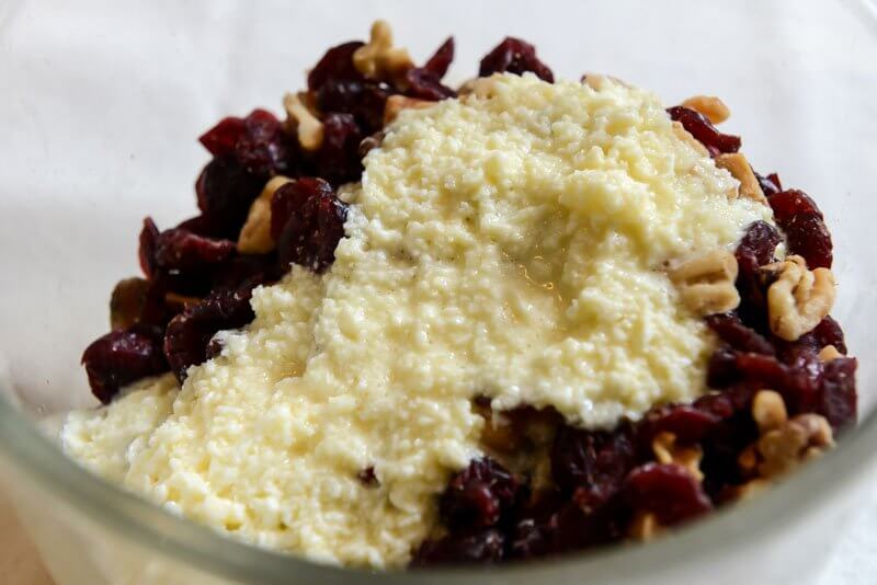 The liquid filling over the cranberries and walnuts.