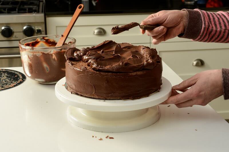 Spreading the chocolate ganache.