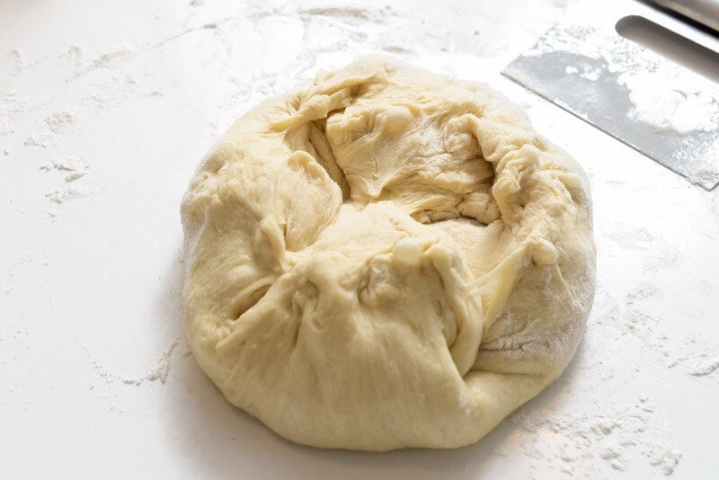 The dough shaped in a ball and ready for the refrigerator.