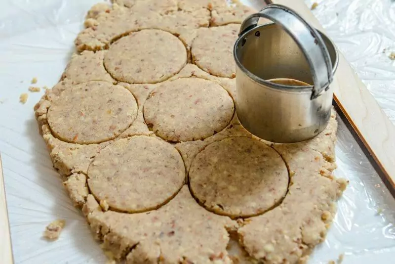 Rolling out and cutting the pecan sandies.