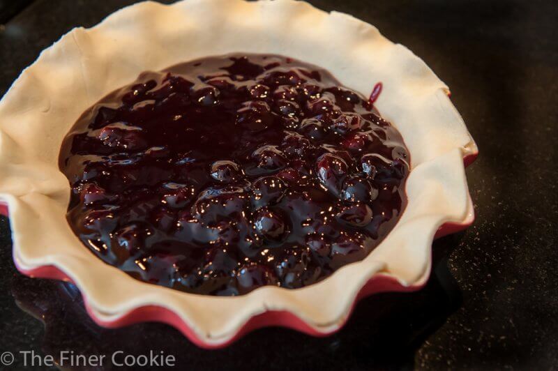 The plate lined with the bottom crust.