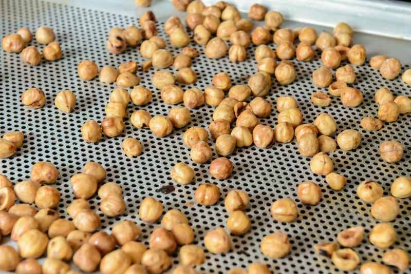 Peeled and roasted hazelnuts for the praline.