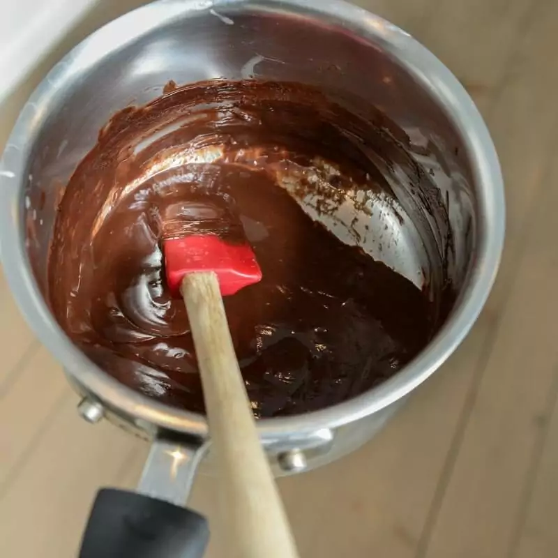 Chocolate Ganache Glaze ready to pour onto the mousse.