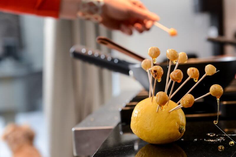 Caramelizing hazelnuts, The Finer Cookie.