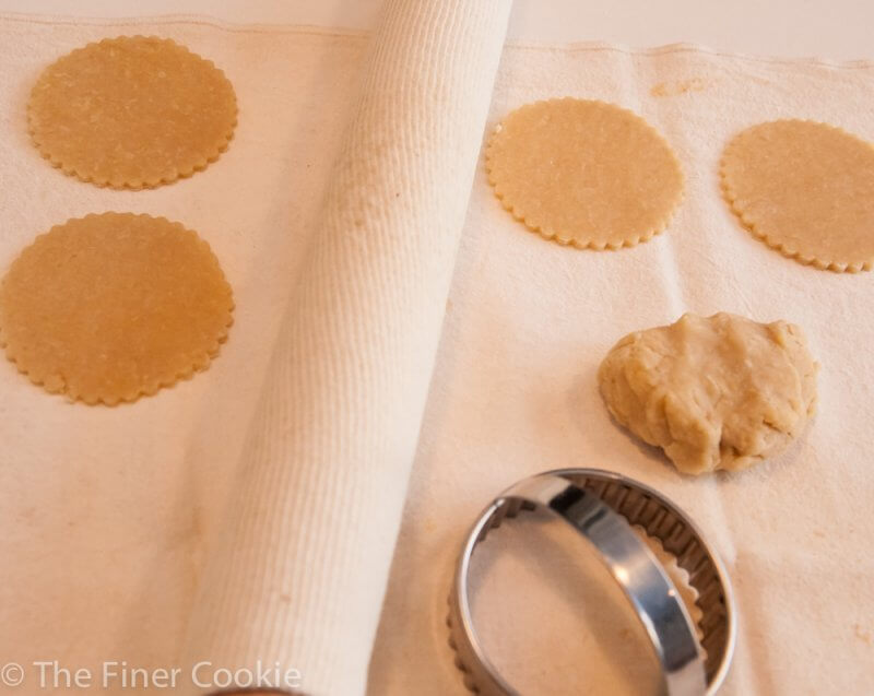 Cutting the hamantaschen pastry.