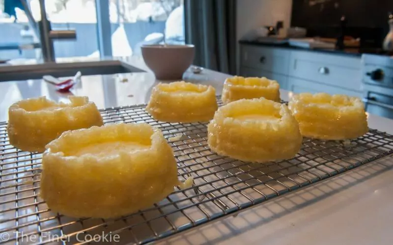 The cakes are glazed and waiting for the posset.