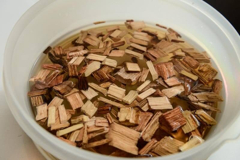 Soaking hickory chips.