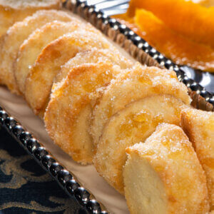 Orange Ginger Butter Cookies at a dessert table.