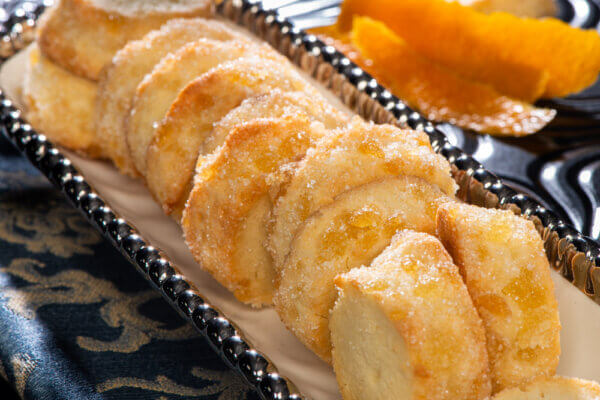 Orange Ginger Butter Cookies at a dessert table.